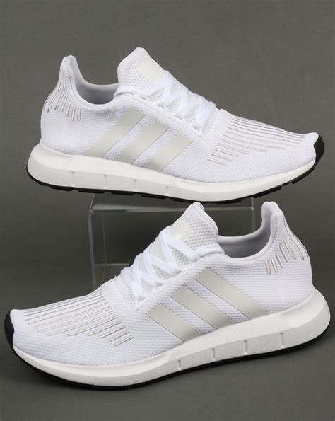 Adidas white athletic shoes